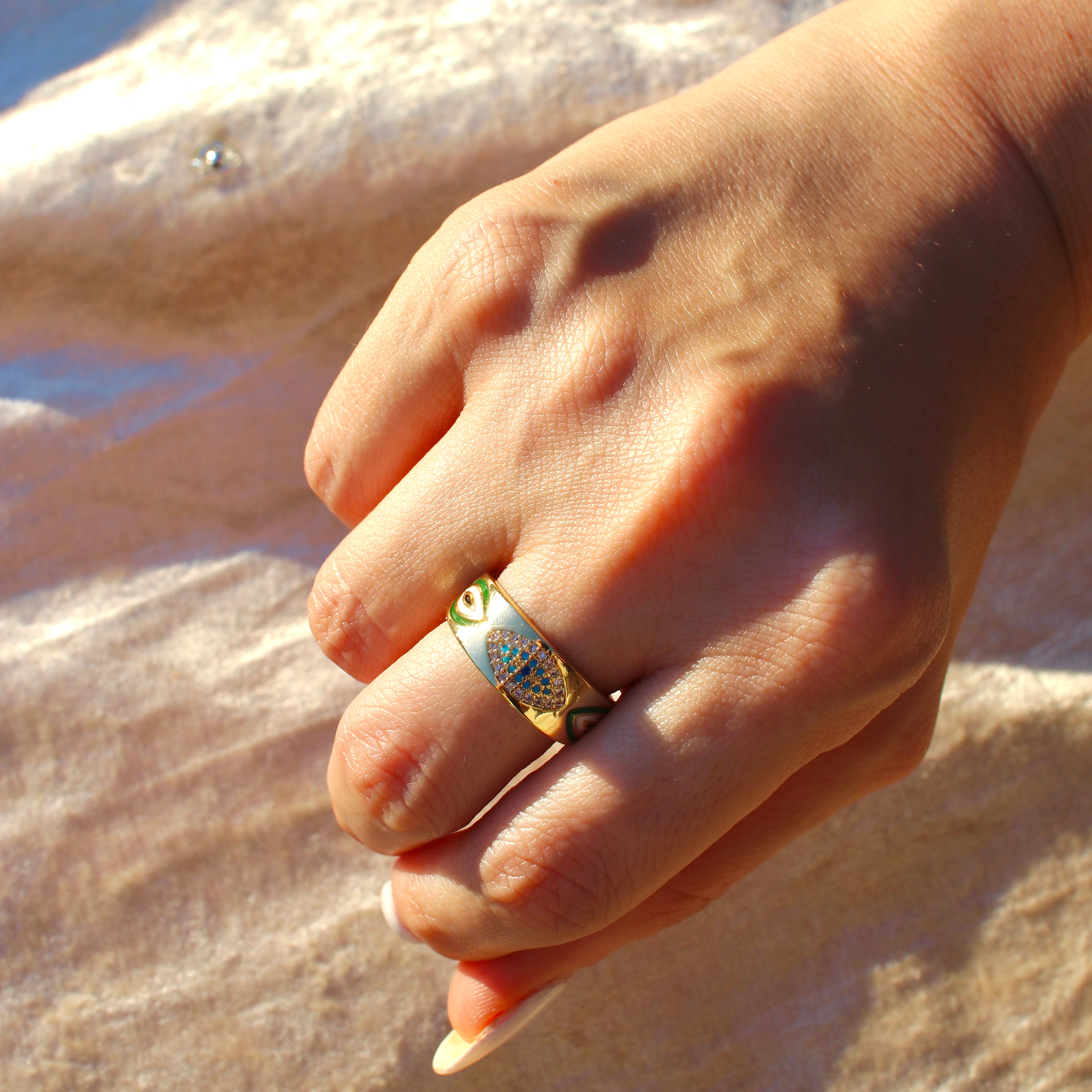 Elegant round evil eye ring