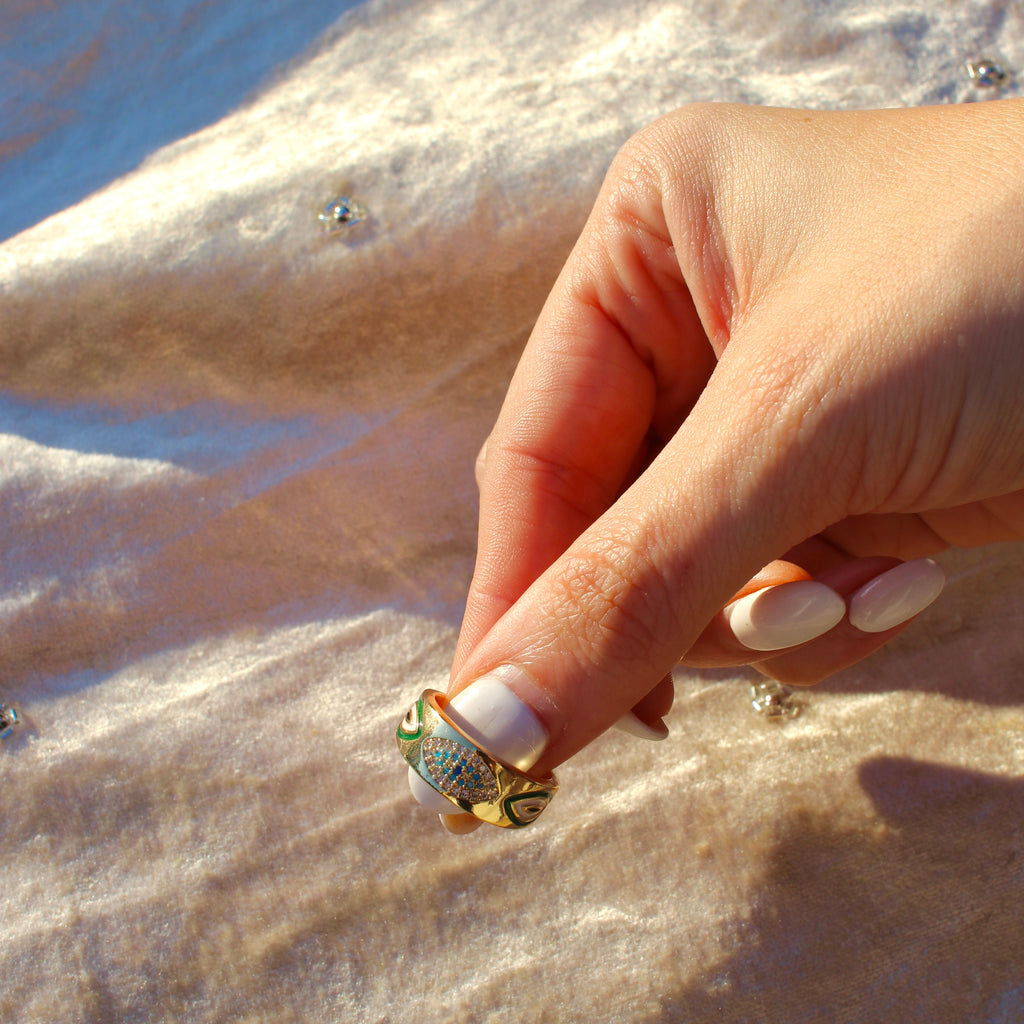 Elegant round evil eye ring