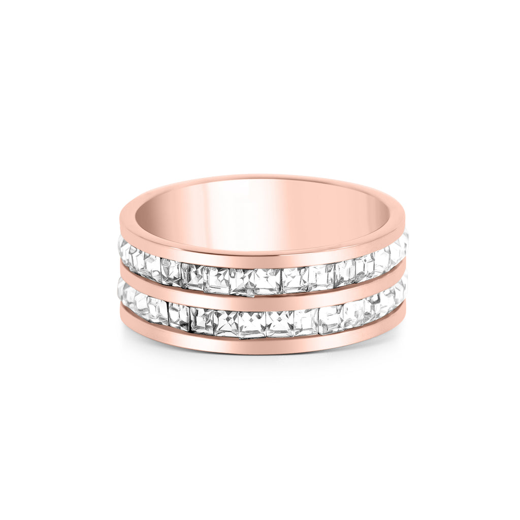 A rose gold ring with titanium steel inlay rhinestones, set in a plain band with a shiny finish.